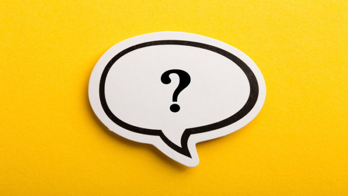 Question mark speech bubble isolated on yellow background.